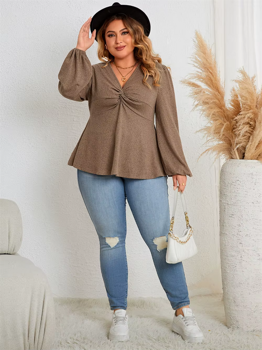 Lässiges Peplum-Top mit V-Ausschnitt und Drehdetail - Vintage Bluse mit Laternenärmeln für den Herbst